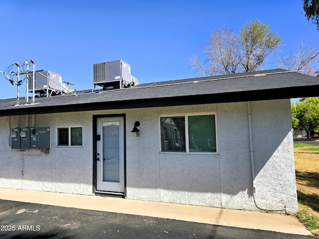 4450 N Longview Ave, Phoenix, AZ 85014 - view of front of house with central AC and stucco siding