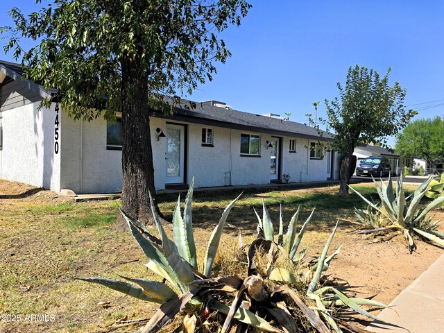 4450 N Longview Ave, Phoenix, AZ 85014 - ranch-style home featuring stucco siding