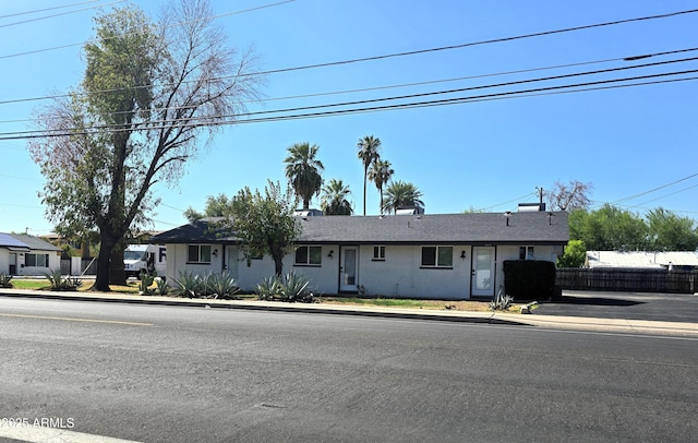 4450 N Longview Ave, Phoenix, AZ 85014 - ranch-style house with fence and stucco siding