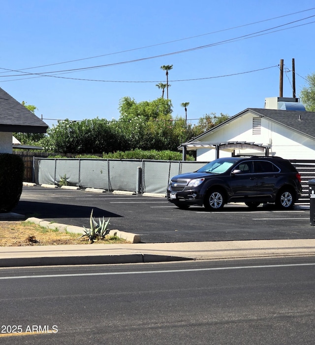 4450 N Longview Ave, Phoenix, AZ 85014 - view of vehicle parking featuring fence