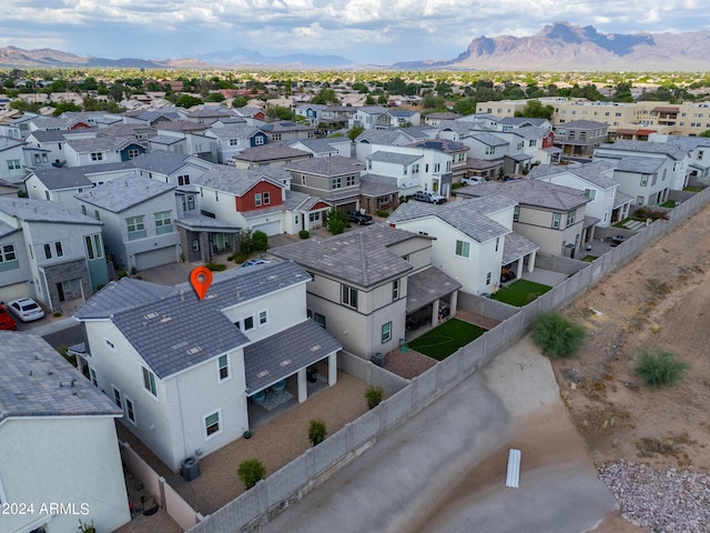 aerial view with a mountain view and a residential view