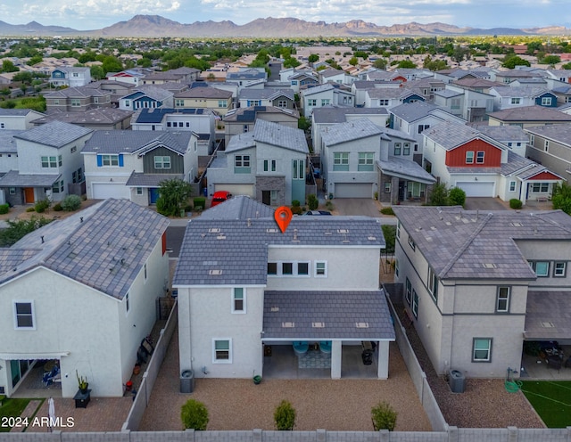 bird's eye view with a residential view and a mountain view