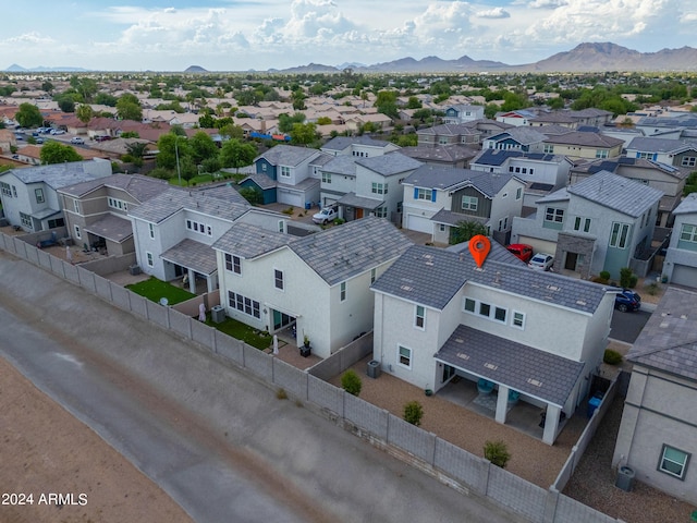 birds eye view of property featuring a residential view and a mountain view