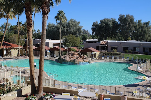 view of swimming pool featuring a patio area