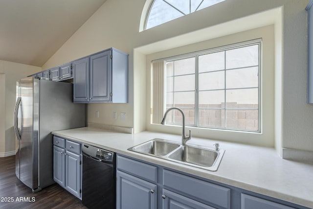 kitchen featuring dishwasher, dark hardwood / wood-style flooring, a wealth of natural light, and sink