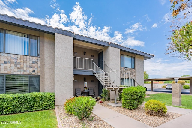 1402 E Guadalupe Rd Unit 207, Tempe, AZ 85283 - view of property with stairs