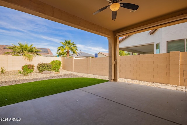 view of patio with ceiling fan