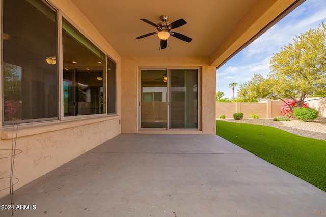 view of patio / terrace featuring ceiling fan