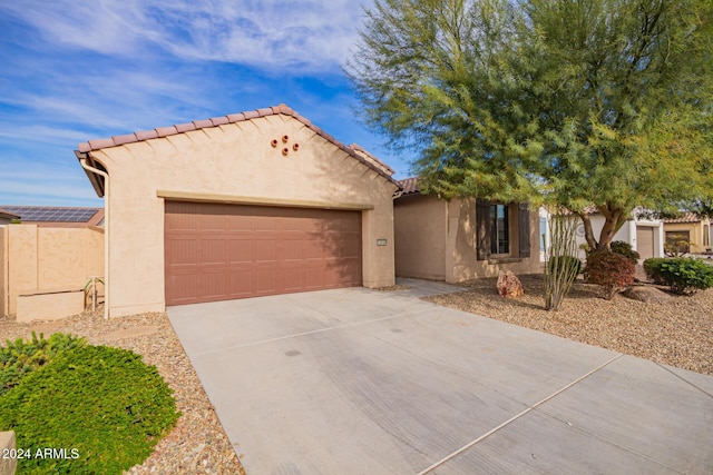 view of front of home featuring a garage