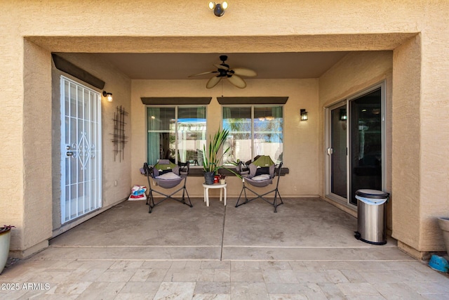 view of patio with ceiling fan