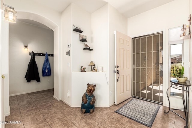 entrance foyer with tile patterned floors