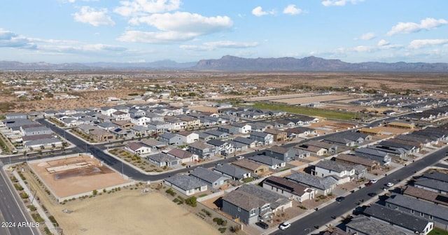 birds eye view of property featuring a mountain view