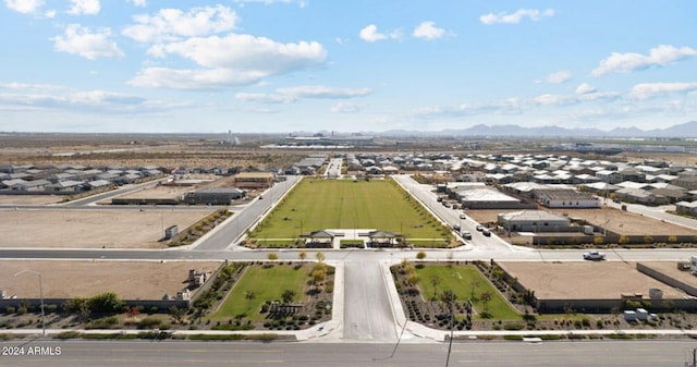 birds eye view of property featuring a mountain view