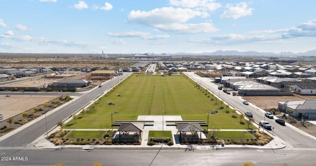 birds eye view of property featuring a mountain view