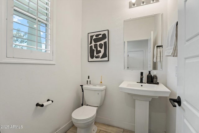 bathroom featuring toilet