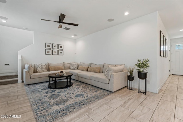 living room featuring ceiling fan