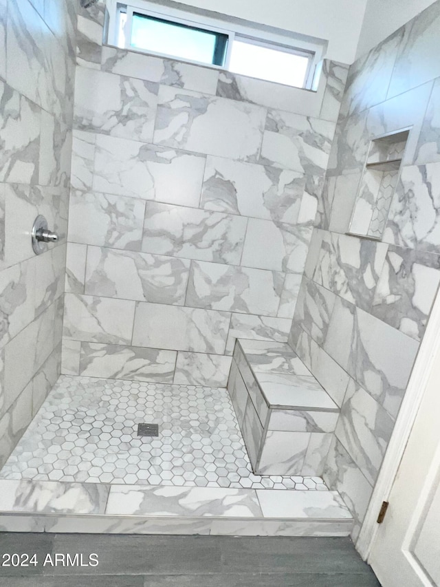 interior space with a tile shower