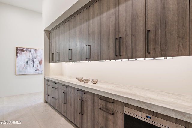 mudroom with light tile patterned floors