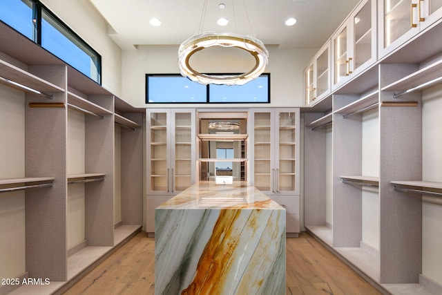 spacious closet with light wood-type flooring