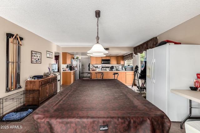 4957 W Onyx Ave, Glendale, AZ 85302 - dining room with a textured ceiling