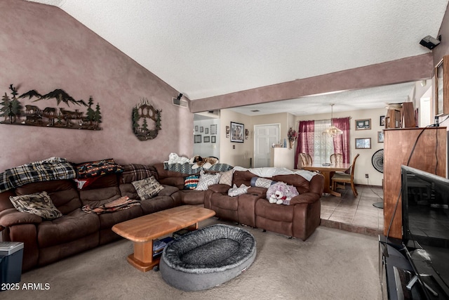 4957 W Onyx Ave, Glendale, AZ 85302 - living area with a textured ceiling, vaulted ceiling, and light carpet