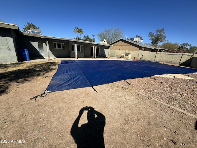 view of pool with a patio, a fenced backyard, and a fenced in pool