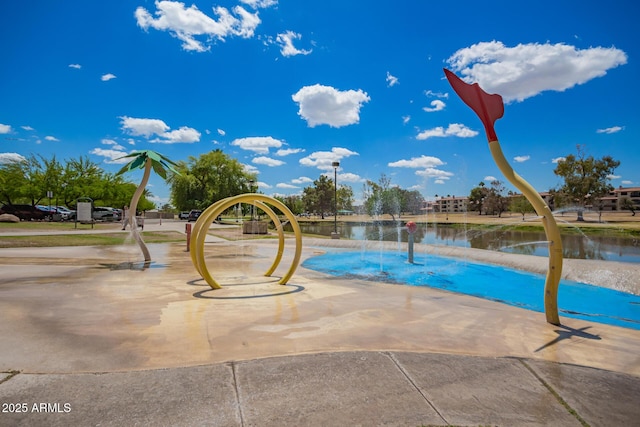 7726 E Kimsey Ln, Scottsdale, AZ 85257 - view of swimming pool featuring a water view