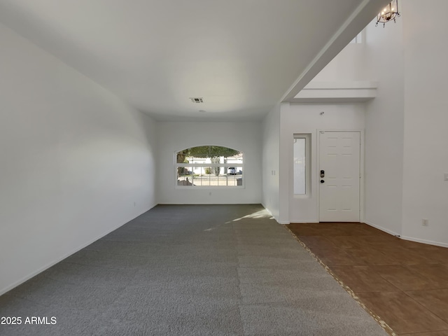 entrance foyer with a notable chandelier