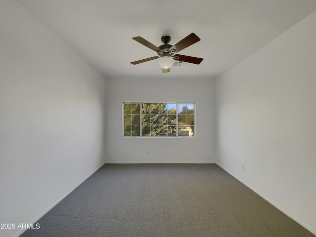 empty room with carpet flooring and ceiling fan