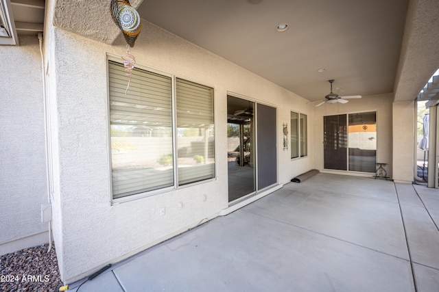 view of patio / terrace featuring ceiling fan