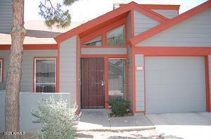 14002 N 49th Ave Unit 1021, Glendale, AZ 85306 - entrance to property with driveway and a garage