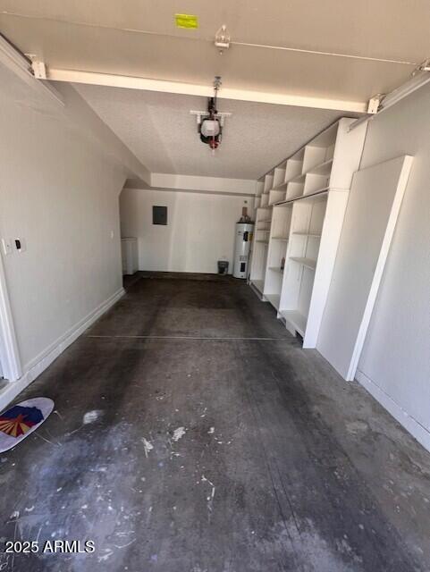 14002 N 49th Ave Unit 1021, Glendale, AZ 85306 - garage featuring water heater and a garage door opener