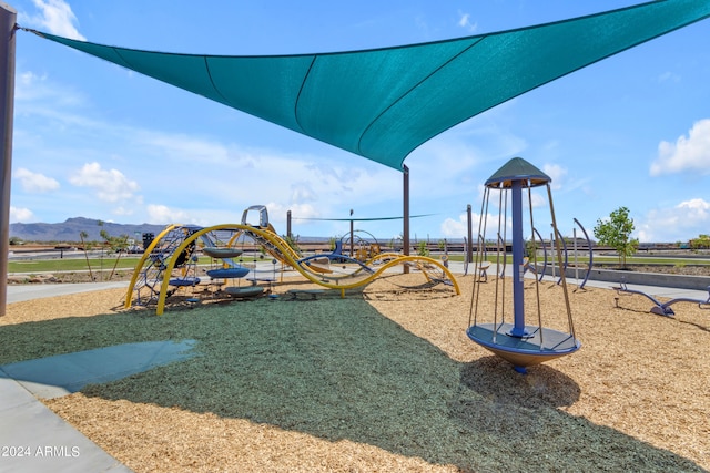 view of play area featuring a mountain view