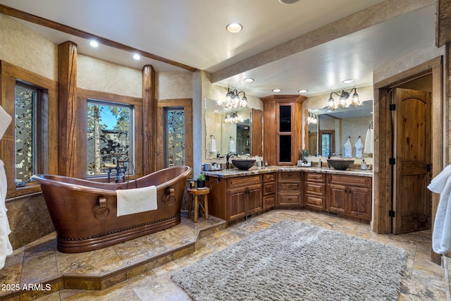 bathroom featuring vanity and a bathtub