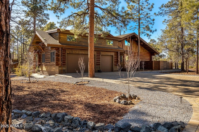 log cabin with a garage