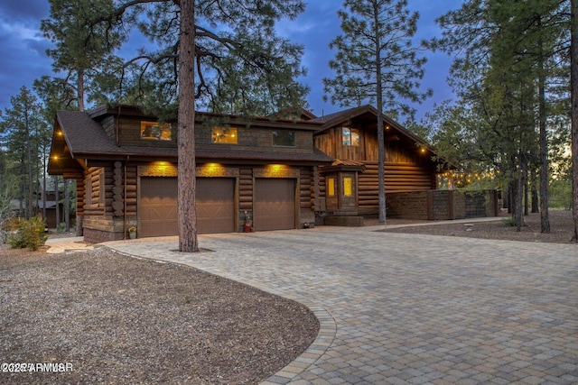 cabin featuring a garage