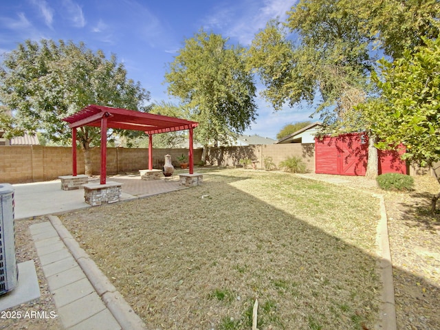 view of yard with an outdoor fire pit and a patio