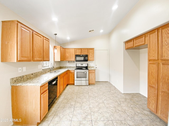 kitchen featuring black appliances, sink, pendant lighting, light stone counters, and lofted ceiling