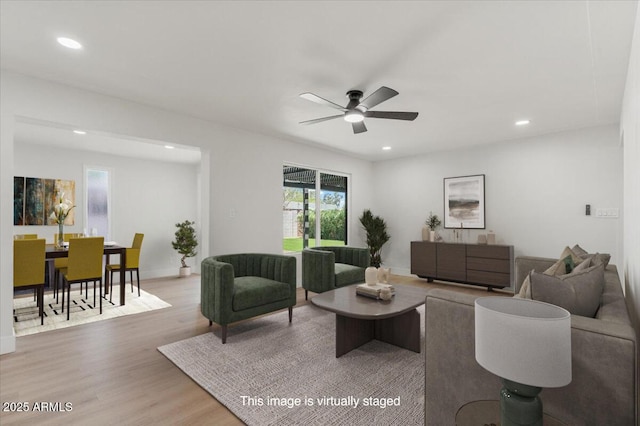 6908 E Windsor Ave, Scottsdale, AZ 85257 - living room featuring wood finished floors, ceiling fan, and recessed lighting