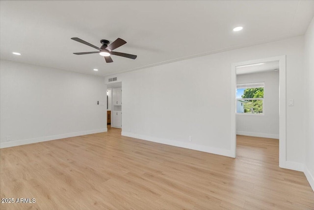 6908 E Windsor Ave, Scottsdale, AZ 85257 - unfurnished room with light wood-type flooring, a ceiling fan, and recessed lighting