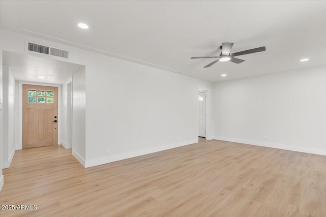 6908 E Windsor Ave, Scottsdale, AZ 85257 - spare room with light wood-style floors, a ceiling fan, and recessed lighting