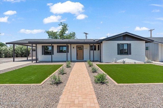 6908 E Windsor Ave, Scottsdale, AZ 85257 - ranch-style home featuring a front lawn, a carport, covered porch, and concrete driveway