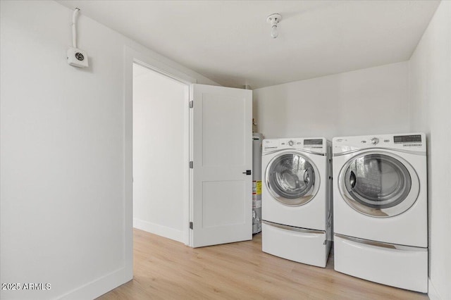 6908 E Windsor Ave, Scottsdale, AZ 85257 - laundry room featuring washing machine and clothes dryer and light wood finished floors