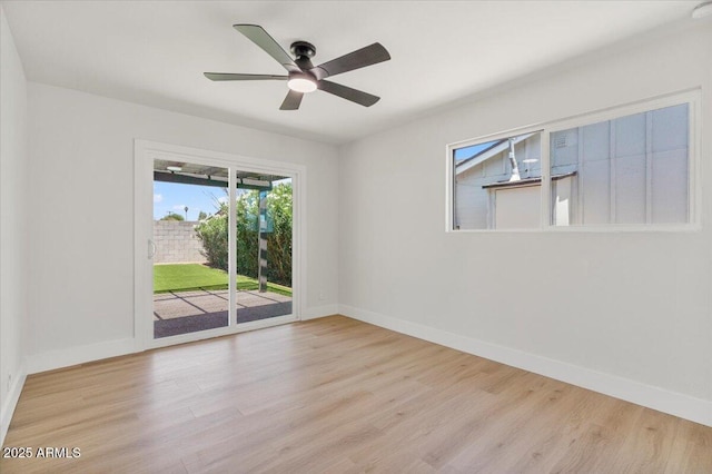6908 E Windsor Ave, Scottsdale, AZ 85257 - unfurnished room featuring wood finished floors and ceiling fan