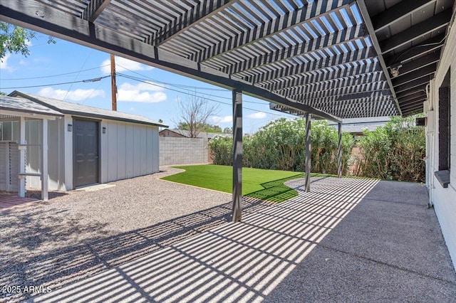 6908 E Windsor Ave, Scottsdale, AZ 85257 - fenced backyard with a pergola, a patio, and an outbuilding