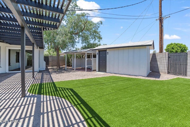 6908 E Windsor Ave, Scottsdale, AZ 85257 - fenced backyard featuring a pergola, a patio area, a gate, and an outbuilding