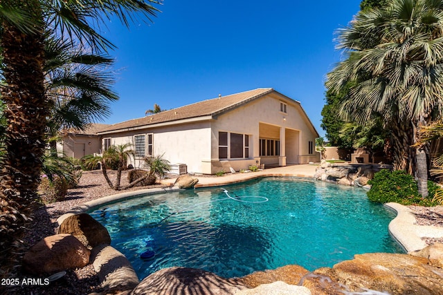 view of pool with a patio area, a fenced in pool, and fence