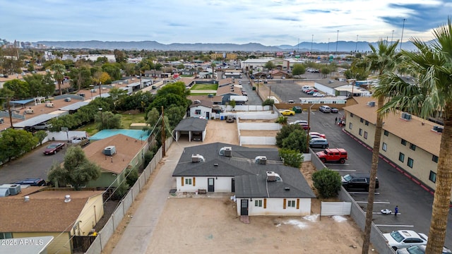 birds eye view of property featuring a mountain view