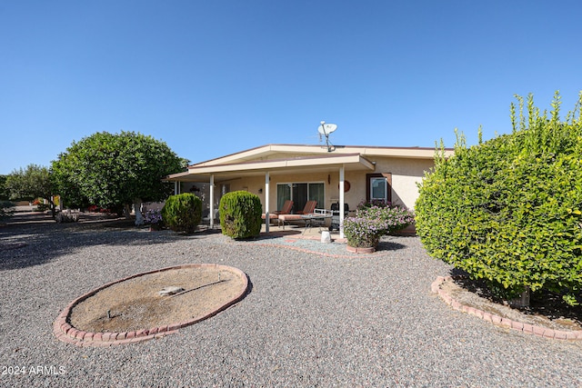 back of house featuring a patio area