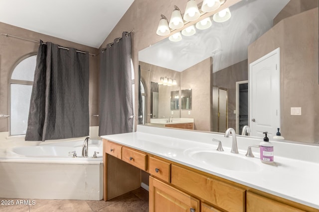 bathroom featuring tile patterned floors, plus walk in shower, vaulted ceiling, and vanity